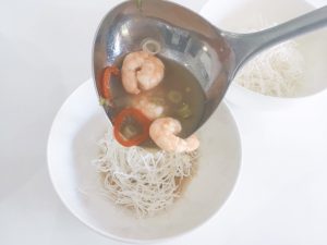 hot sour prawn noodle soup add to bowl