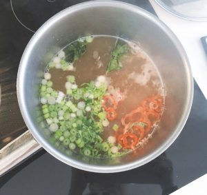 hot sour prawn noodle soup in pan