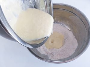 Coconut muffins with raspberries combine liquid & dry